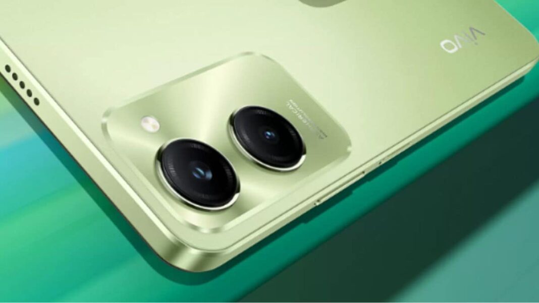 Close-up of a green smartphone's dual camera system.