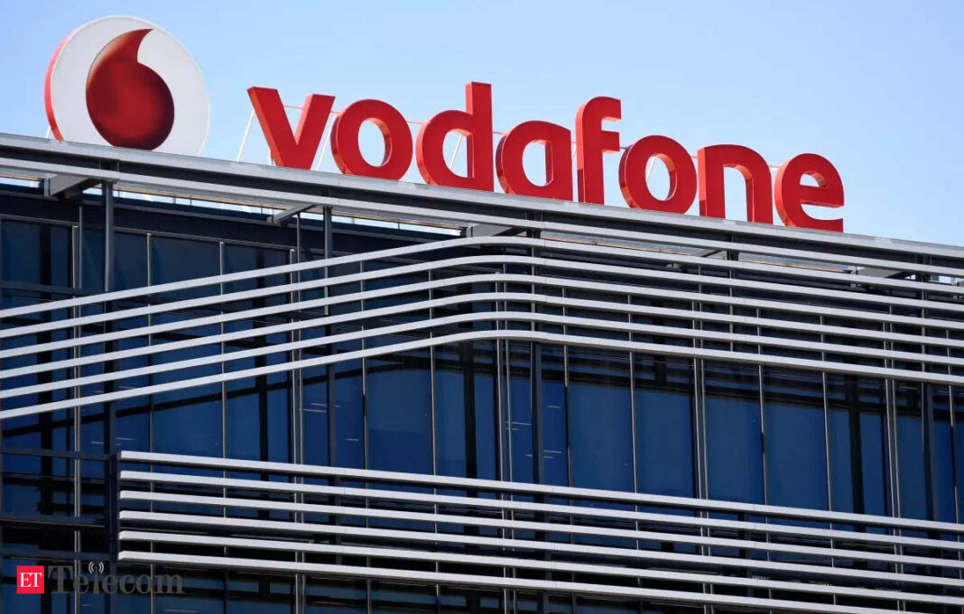 Vodafone logo on building facade.