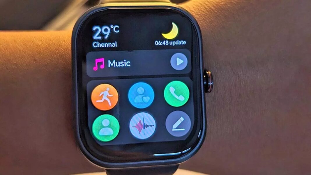 Smartwatch on wrist displaying apps and temperature.