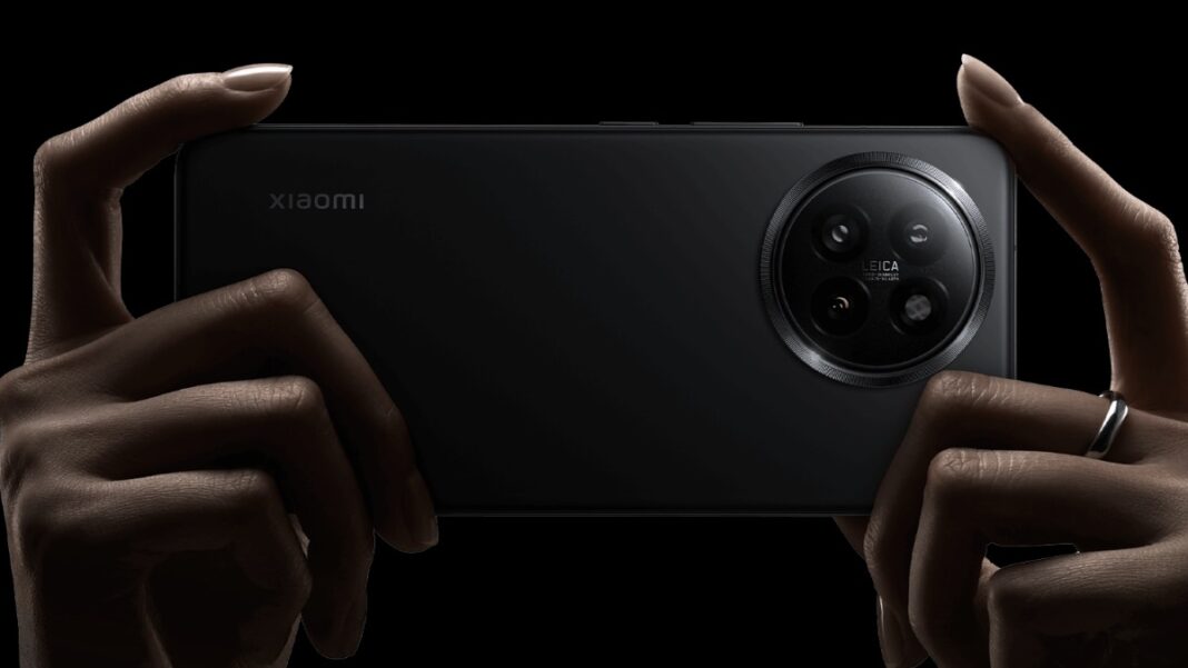 Person holding Xiaomi smartphone with Leica camera.