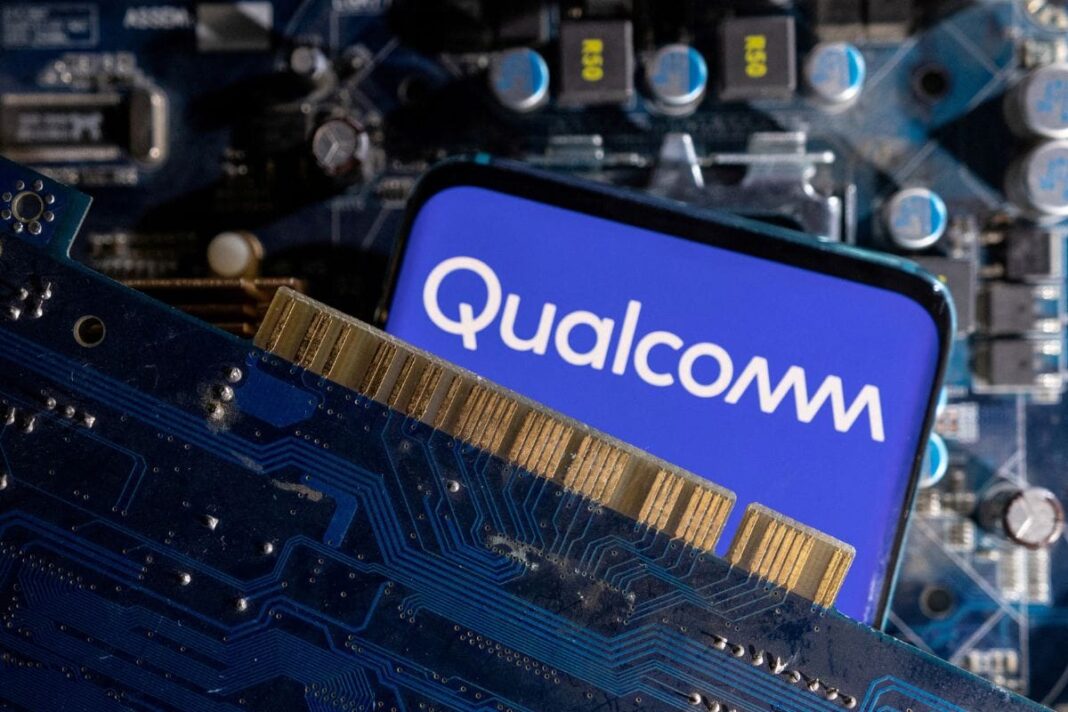 Qualcomm logo on smartphone circuit board.