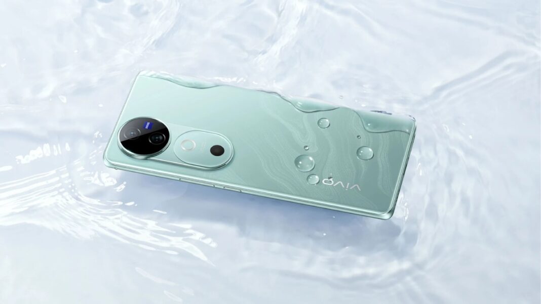 Mint green smartphone on water displaying resistance.