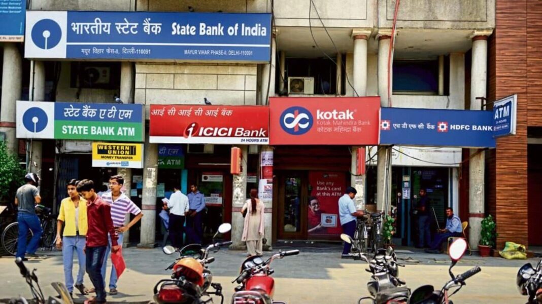 People walking past multiple bank branches and ATMs.