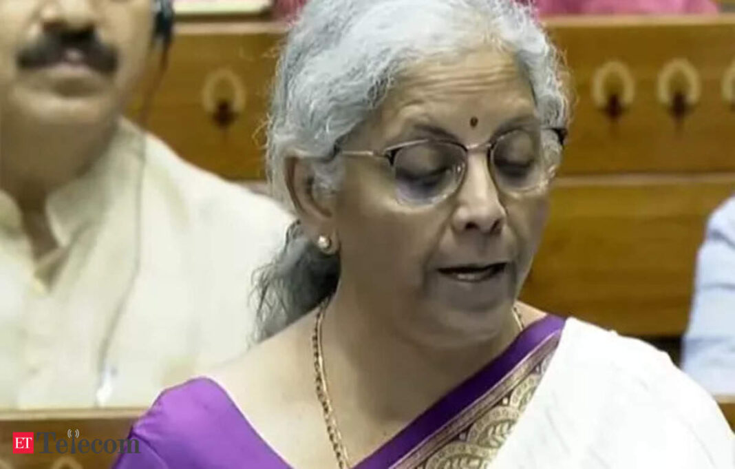 Woman speaking at government assembly.