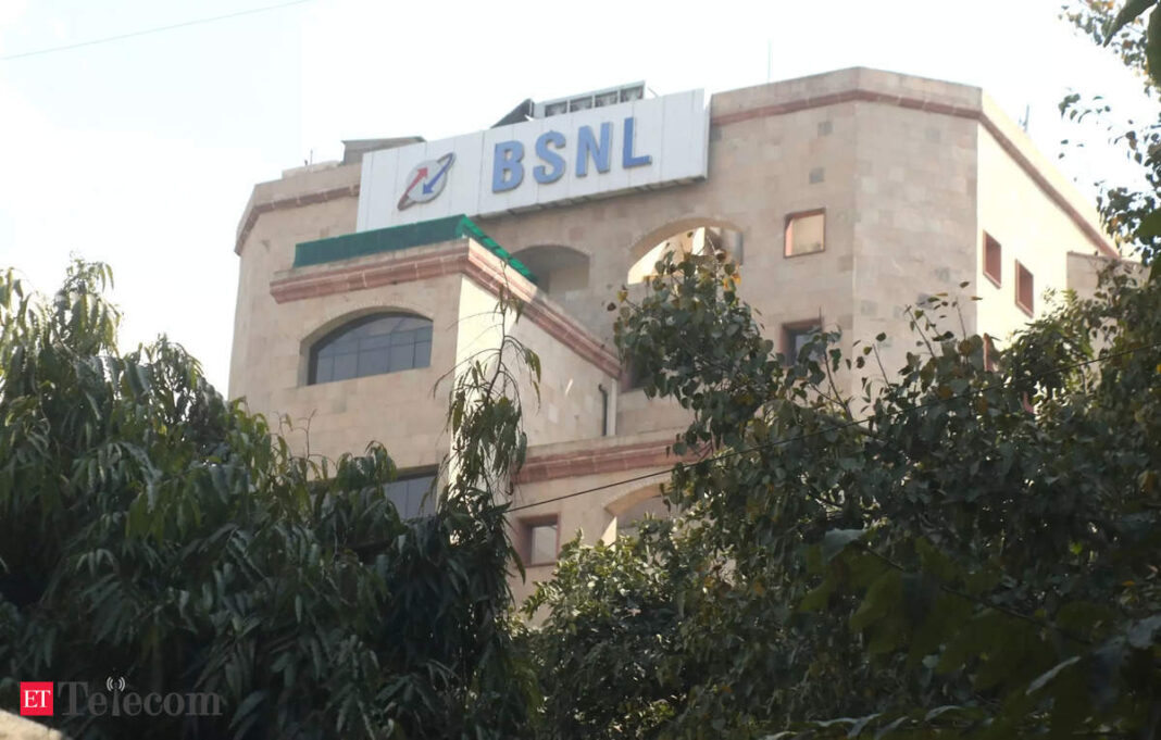 BSNL building behind trees in daylight