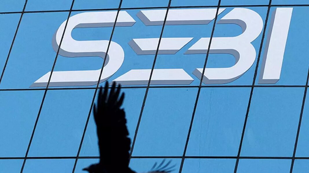 Shadow of hand on SEBI logo building.