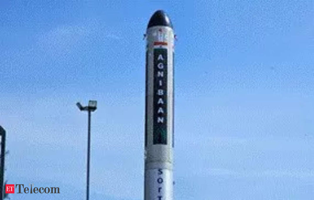 Agnibaan rocket on launching pad against sky.