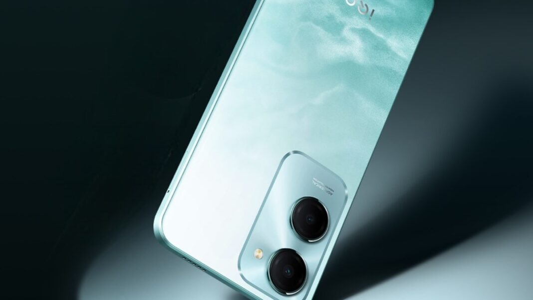 Smartphone with dual cameras on reflective surface.
