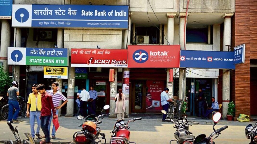 People outside various bank ATMs in India.