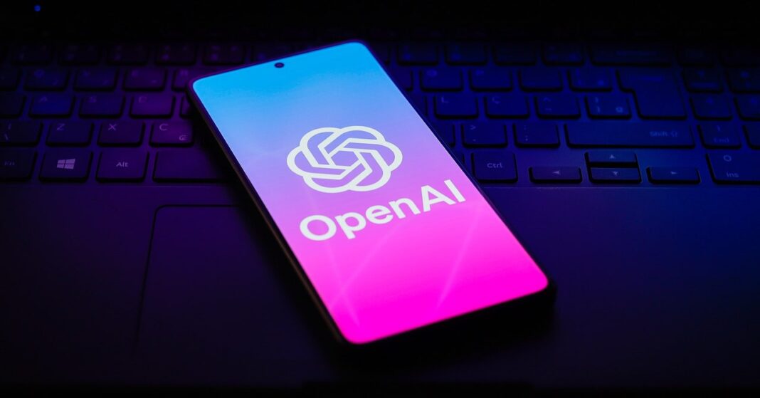 Smartphone with OpenAI logo on screen.