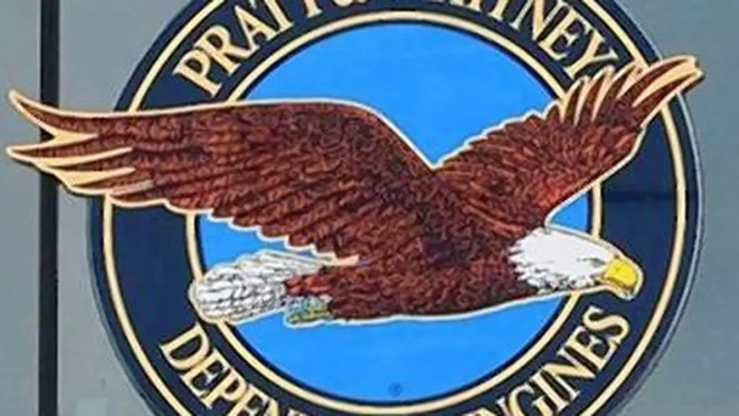 Emblem with eagle, blue background, inscribed "Defense Agencies.