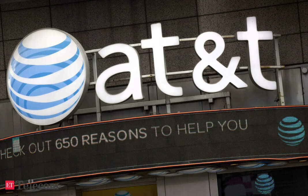 AT&T logo on storefront with promotional message.