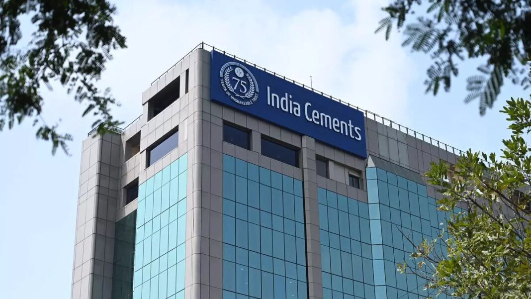 India Cements building facade with logo and trees.