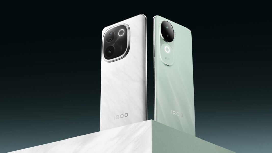 Two iQOO smartphones, white and green, on angled surface.