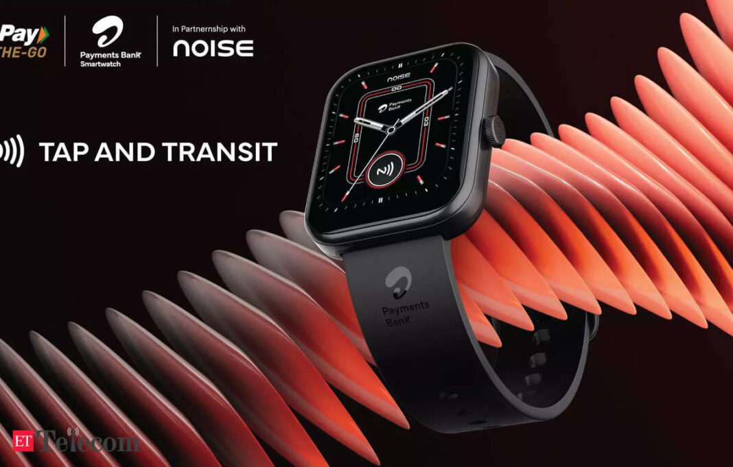 Smartwatch featuring tap-to-pay functionality on abstract background.