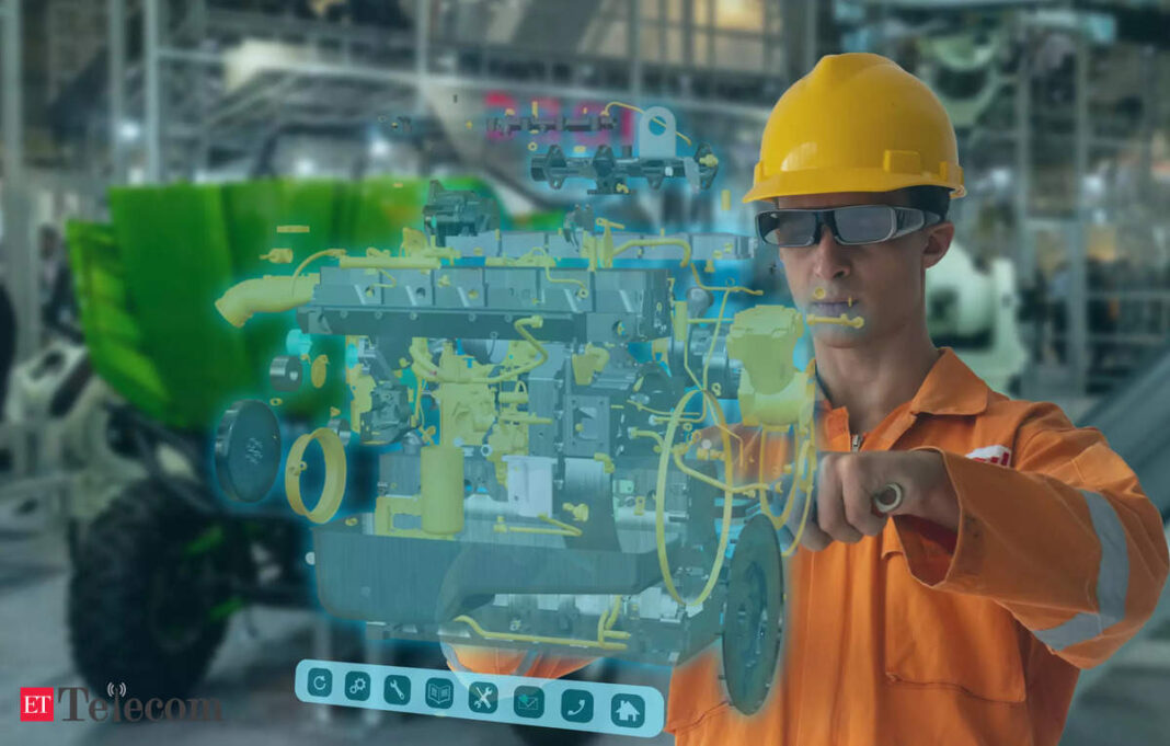 Worker using AR for engine analysis.