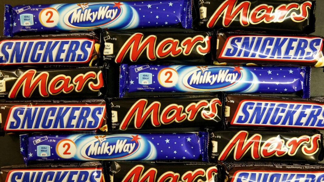 Assorted chocolate bars: Snickers, Mars, Milky Way.