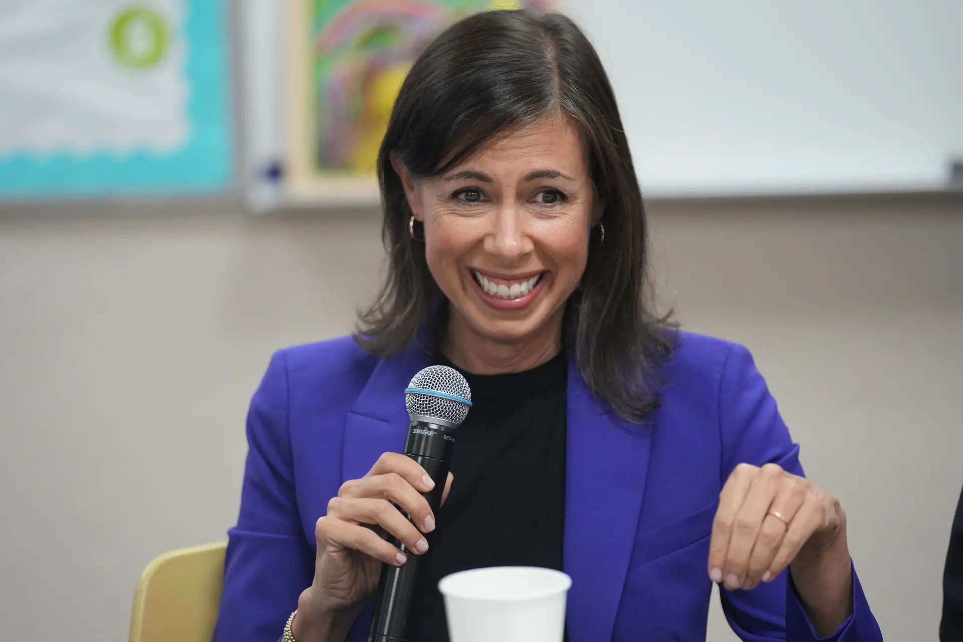 Jessica Rosenworcel, Chairwoman of the Federal Communications Commission, talks to parents during a visit to Union Avenue Elementary, Tuesday, Aug. 13, 2024, in Los Angeles. (AP Photo/Marcio Jose Sanchez)