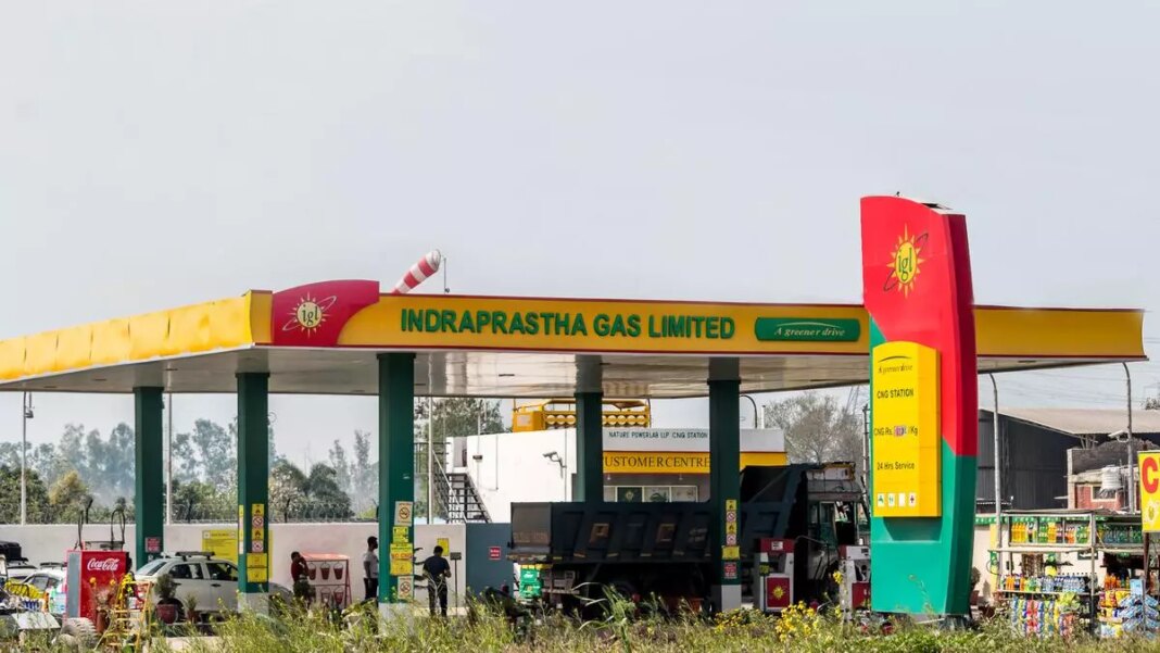 Indraprastha Gas Station with CNG pumps and market