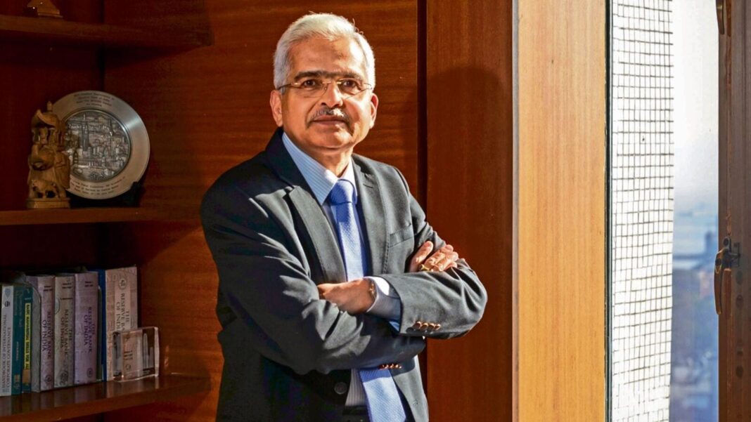 Professional man standing confidently in a well-lit office.