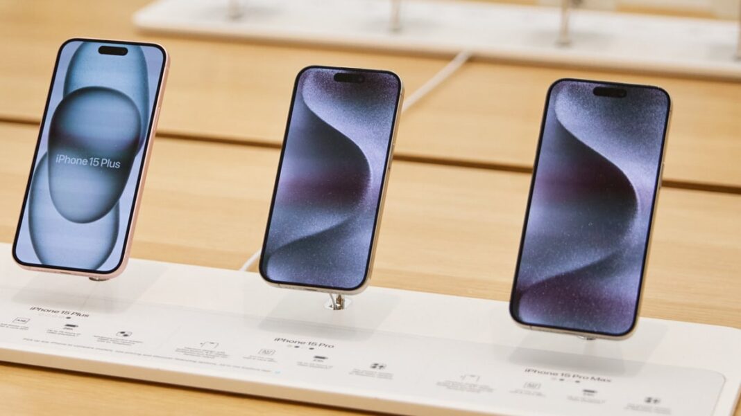 Three new iPhone models on display.