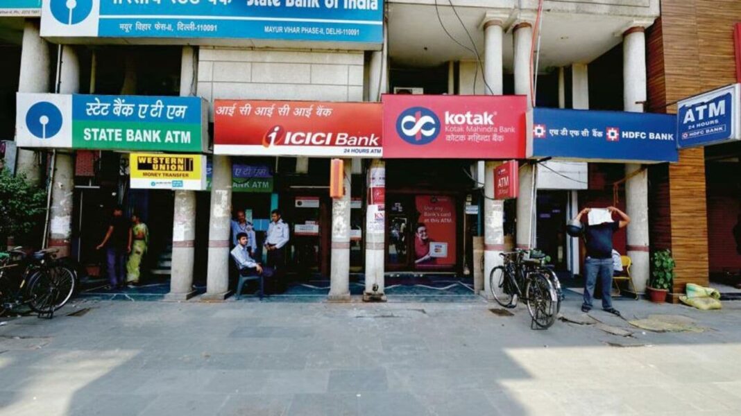 Indian street with multiple bank ATMs.