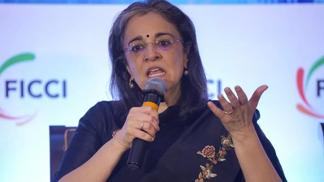 Woman speaking at conference with microphone.