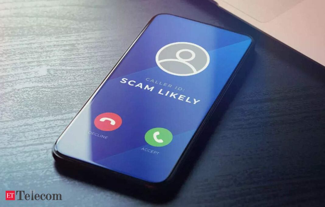 Smartphone screen showing scam call alert.