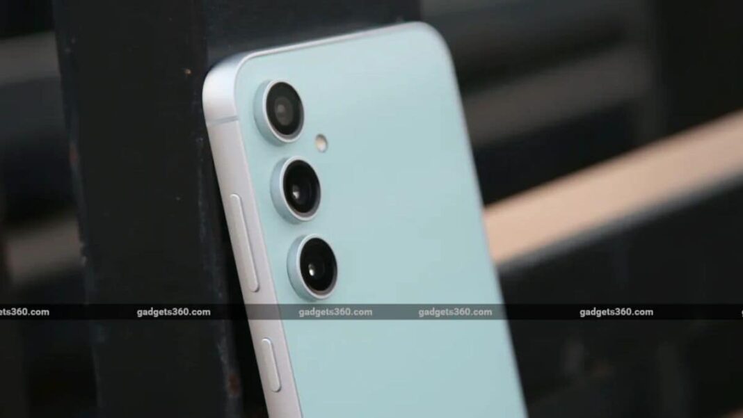 Mint green smartphone with triple camera setup.