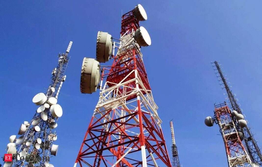 Cellular network towers against blue sky