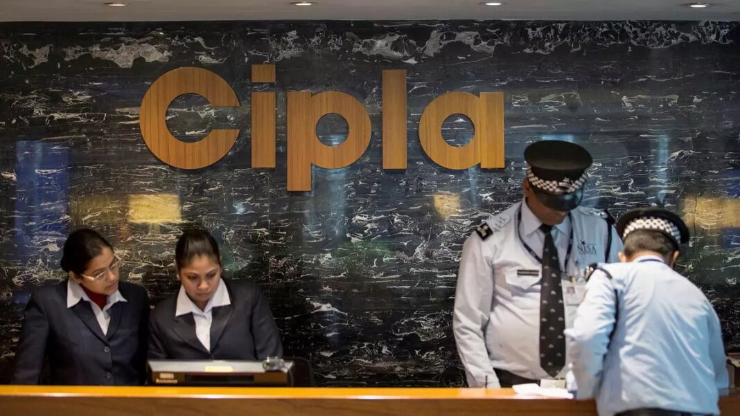 Security personnel at Cipla office reception desk.