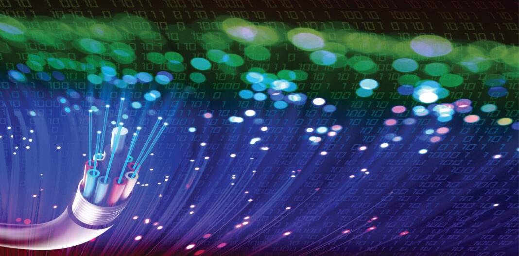 Optical fibers transmitting binary code data signals.