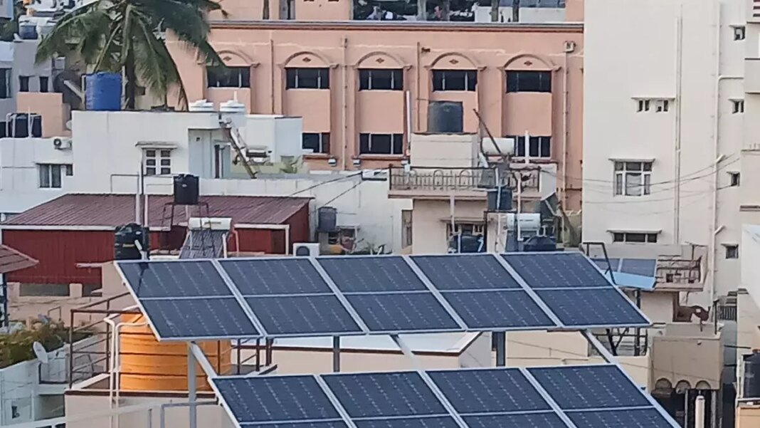 Solar panels on urban building rooftops.