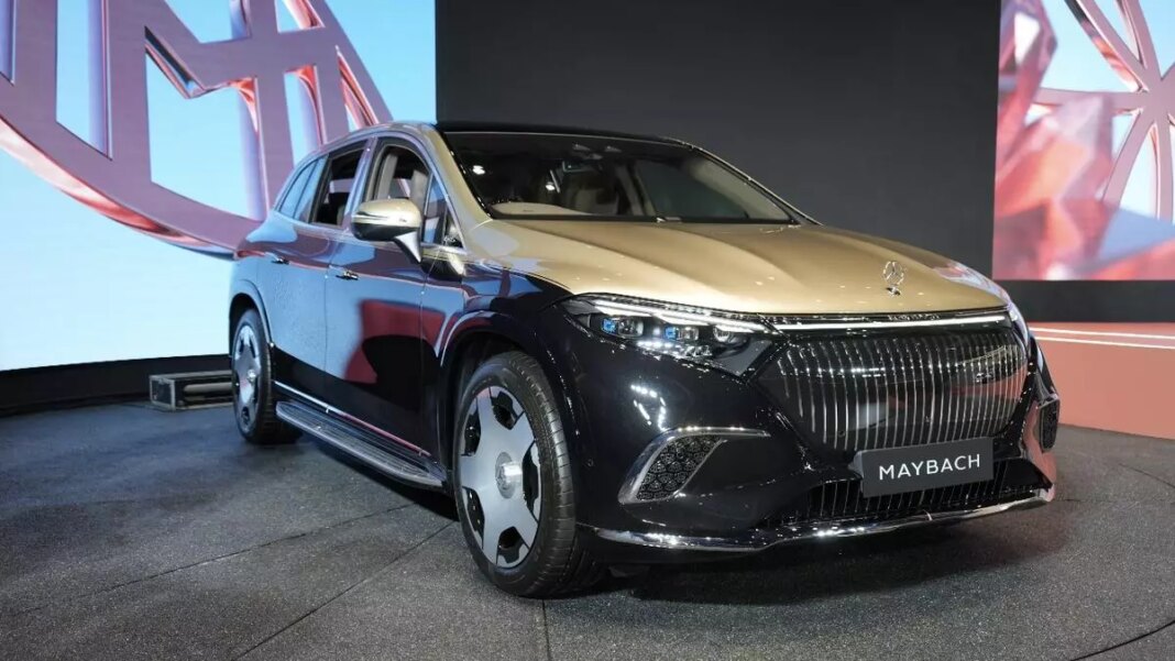 Luxury vehicle Maybach on display at auto show.