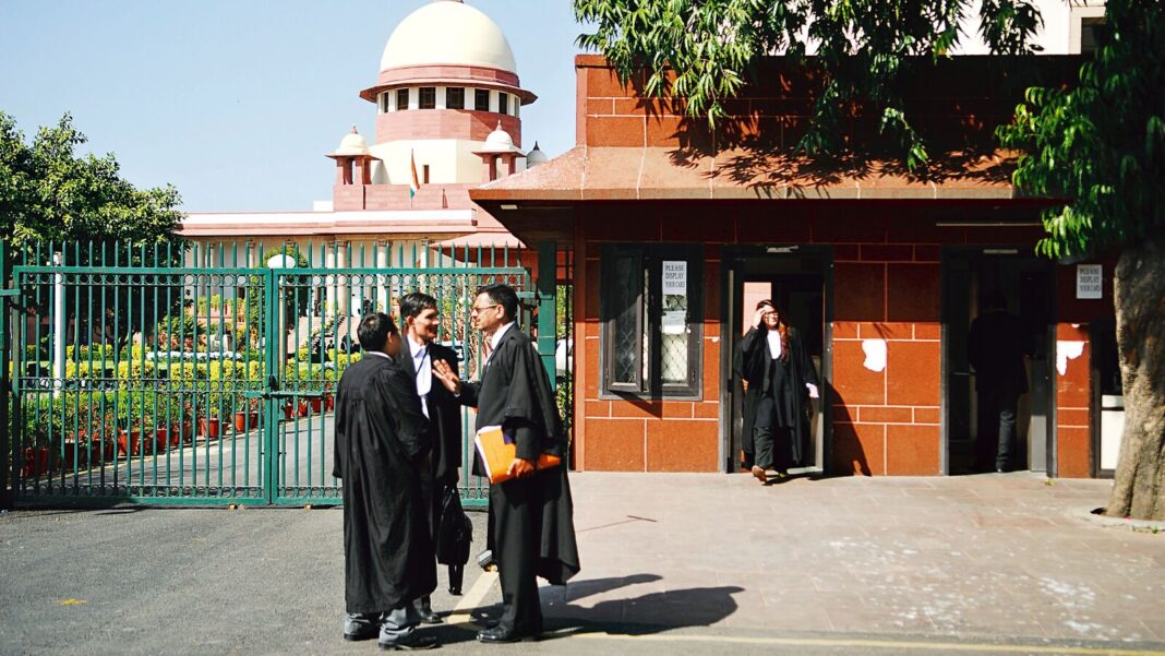 Lawyers conversing outside a courthouse