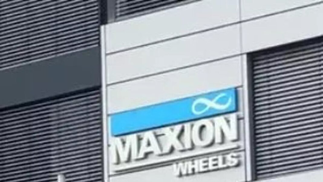 Maxion Wheels company sign on building facade