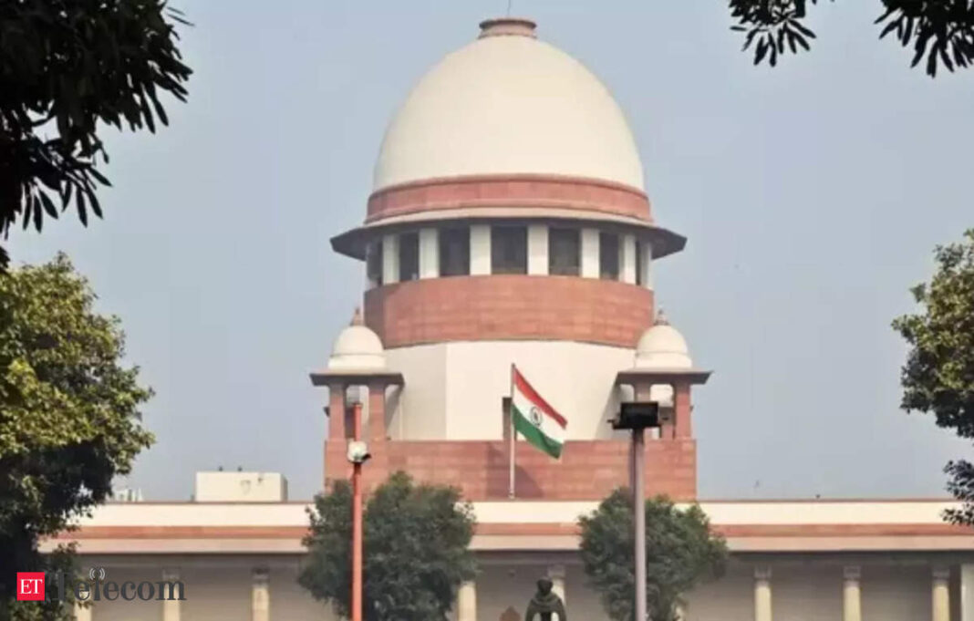 Indian Supreme Court building with flag.