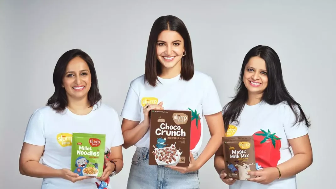 Three women showcasing healthy snack products.